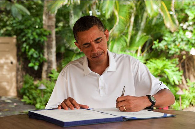 President Obama signs the James Zadroga 9/11 Health and Compensation Act while in Hawaii